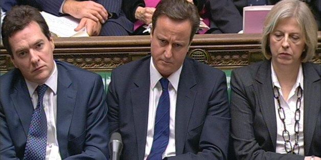 Conservative leader David Cameron (centre), Shadow Chancellor George Osborne (left) and Shadow Secretary of State for Work and Pensions Theresa May (right)listen to Prime Minister Gordon Brown during Prime Minister's Questions in the House of Commons, London.