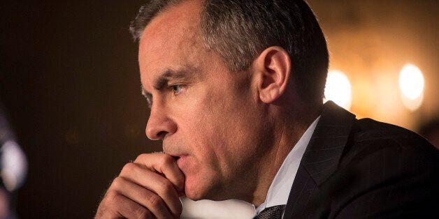 Mark Carney, governor of the Bank of England, pauses during a news conference in Edinburgh, U.K., on Wednesday, Jan. 29, 2014. Scotland will probably need to mirror the euro-region's integration plans and surrender some sovereignty if the nation votes to separate from the rest of the U.K., Carney said. Photographer: Simon Dawson/Bloomberg via Getty Images