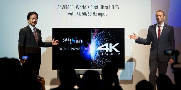 Panasonic's Managing Director AVC Yoshiyuki Miyabe (l) with the new TV