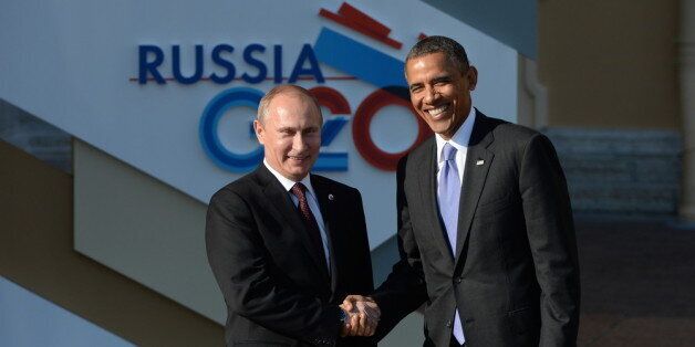 ST. PETERSBURG, RUSSIA - SEPTEMBER 05: In this handout image provided by Host Photo Agency, Russian President Vladimir Putin (L) greets U.S. President Barack Obama at the G20 summit on September 5, 2013 in St. Petersburg, Russia. The G20 summit is expected to be dominated by the issue of military action in Syria while issues surrounding the global economy, including tax avoidance by multinationals, will also be discussed during the two-day summit. (Photo by Ramil Sitdikov/Host Photo Agency via