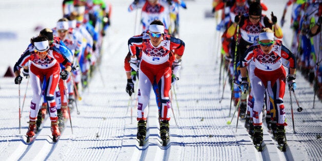 SOCHI, RUSSIA - FEBRUARY 08: (R-L) Marit Bjoergen, Therese Johaug and Heidi Weng of Norway compete in the Ladies' Skiathlon 7.5 km Classic + 7.5 km Free during day one of the Sochi 2014 Winter Olympics at Laura Cross-country Ski & Biathlon Center on February 8, 2014 in Sochi, Russia. (Photo by Richard Heathcote/Getty Images)