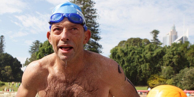 SYDNEY, AUSTRALIA - JANUARY 26: Opposition leader Tony Abbott completes the Body Science Great Australian Swim Series at the Sydney Harbour on January 26, 2011 in Sydney, Australia. The inaugural ocean swim event brings people of all ages together to compete in distances between 300 metres and 2.5 kilometres against the backdrop of the Sydney Harbour. (Photo by Craig Golding/Getty Images)