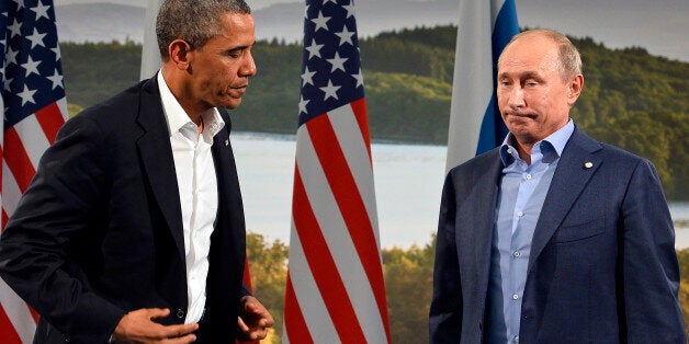 US President Barack Obama (L) holds a bilateral meeting with Russian President Vladimir Putin during the G8 summit at the Lough Erne resort near Enniskillen in Northern Ireland, on June 17, 2013. The conflict in Syria was set to dominate the G8 summit starting in Northern Ireland on Monday, with Western leaders upping pressure on Russia to back away from its support for President Bashar al-Assad. AFP PHOTO / JEWEL SAMAD (Photo credit should read JEWEL SAMAD/AFP/Getty Images)