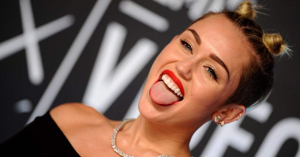 Miley Cyrus Posts Picture Of Herself With Two Reefers At Once Behind 