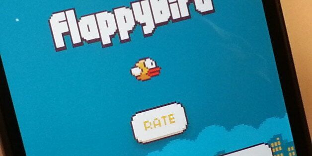 A view of the FlappyBird game open on an iPhone.