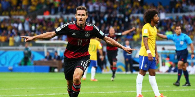 BELO HORIZONTE, BRAZIL - JULY 08: Miroslav Klose of Germany celebrates scoring his team's second goal during the 2014 FIFA World Cup Brazil Semi Final match between Brazil and Germany at Estadio Mineirao on July 8, 2014 in Belo Horizonte, Brazil. (Photo by Robert Cianflone/Getty Images)
