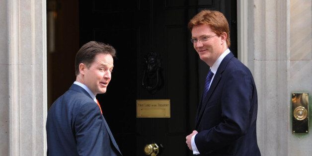 Deputy Prime Minister Nick Clegg (left)and Scottish Secretary Danny Alexander arrives in Downing Street for cabinet meeting before the state opening of parliament.