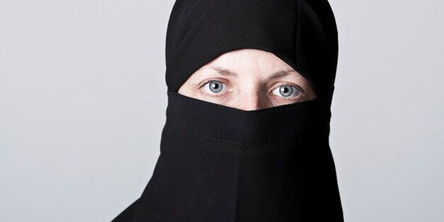 Woman wearing niqab and hijab, portrait