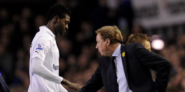 LIVERPOOL, ENGLAND - MARCH 10: Emmanuel Adebayor of Tottenham Hotspur is substituted by Manager Harry Redknapp during the Barclays Premier League match between Everton and Tottenham Hotspur at Goodison Park on March 10, 2012 in Liverpool, England. (Photo by Michael Regan/Getty Images)