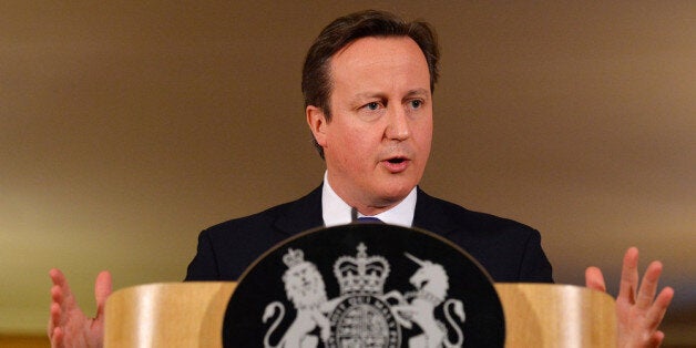 LONDON, UNITED KINGDOM - FEBRUARY 11: Britain's Prime Minister David Cameron addresses the media during a press conference at 10 Downing street on February 11, 2014 in London, England. Cameron held the press conference after returning from a tour of the flood hit areas of south-west England. (Photo by Ben Stansall/WPA Pool/Getty Images)