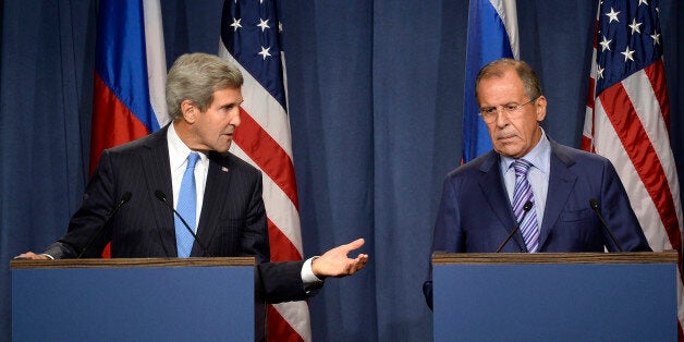 US Secretary of State John Kerry (L) and Russian Foreign minister Sergey Lavrov (R) give a press conference in Geneva following their meeting on Syria's chemical weapons, on September 12, 2013. Russian Foreign Minister Sergei Lavrov on September 12 said there was still 'a chance for peace' in Syria as he prepared for high-stakes talks with his US counterpart on a plan for Damascus to give up its chemical weapons. Before leaving for the talks in Geneva, Lavrov said during a visit to Kazakhstan t