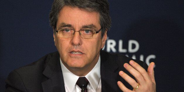 World Trade Organization (WTO) Director-General Roberto Azevedo of Brazil talks during a press conference at the World Economic Forum in Davos on January 25, 2014. Some 40 world leaders gather in the Swiss ski resort Davos to discuss and debate a wide range of issues including the causes of conflicts plaguing the Middle East, and how to reinvigorate the global economy. AFP PHOTO / ERIC PIERMONT (Photo credit should read ERIC PIERMONT/AFP/Getty Images)