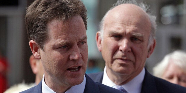 SOUTHAMPTON, ENGLAND - APRIL 27: Liberal Democrat leader Nick Clegg accompanied by shadow chancellor Vince Cable speak to supporters and the waiting media outside Southampton General Hospital on April 27, 2010 in Southampton, England. The General Election, to be held on May 6, 2010 is set to be one of the most closely fought political contests in recent times with all main party leaders embarking on a four week campaign to win the votes of the United Kingdom. (Photo by Matt Cardy/Getty Images)