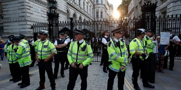 Police stand guard outside Downing Street
