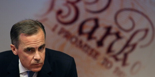 Mark Carney, governor of the Bank of England, pauses during the bank's quarterly inflation report news conference at the Bank of England in London, U.K., on Wednesday, Feb. 12, 2014. The Bank of England said it will keep its key interest rate at a record low even after unemployment reaches its 7 percent threshold as it introduced a new phase of Carney's forward-guidance policy. Photographer: Chris Ratcliffe/Bloomberg via Getty Images