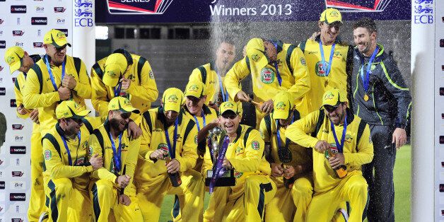 The Australian team celebrate with the trophy after winning the fifth One Day International (ODI) cricket match between England and Australia at the Ageas Bowl in Southampton, England on September 16, 2013. Shane Watson's century saw Australia to a 49-run win over England in the fifth one-day international at Southampton as their lengthy tour ended with a 2-1 series victory. AFP PHOTO / GLYN KIRK RESTRICTED TO EDITORIAL USE. NO ASSOCIATION WITH DIRECT COMPETITOR OF SPONSOR, PARTNER, OR SUPPL