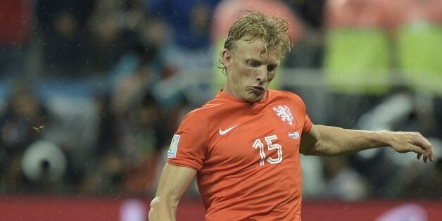 Netherlands' midfielder Dirk Kuyt takes a shot during penalty shoot-outs following extra time during the semi-final football match between Netherlands and Argentina of the FIFA World Cup at The Corinthians Arena in Sao Paulo on July 9, 2014. AFP PHOTO / JUAN MABROMATA (Photo credit should read JUAN MABROMATA/AFP/Getty Images)