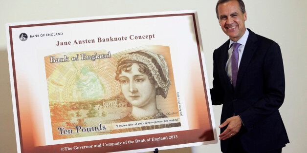 Mark Carney, governor of the Bank of England, stands alongside the concept design for the new Bank of England ten pound banknote, featuring author Jane Austen during the presentation at the Jane Austen House Museum in Chawton, near Alton, U.K., on Wednesday, July 24, 2013. Jane Austen will appear on the U.K.'s next 10-pound note, ensuring at least one female figure is represented on the currency in circulation. Photographer: Chris Ratcliffe/Bloomberg via Getty Images