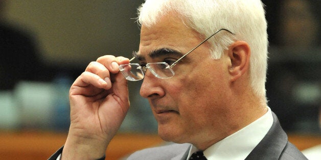 British Chancellor of the Exchequer Alistair Darling waits before an extraordinary EU Economy and Finance Council meeting on May 9, 2010 at EU headquarters in Brussels. Sources said that ministers were examining a series of elements as part of plans to establish common bailout funds for troubled members hit by a debt crisis triggered in Greece, but which has since spread to other countries. AFP PHOTO / GEORGES GOBET (Photo credit should read GEORGES GOBET/AFP/Getty Images)