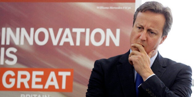 WANTAGE, ENGLAND - JULY 11: British Prime Minister David Cameron listens during a visit to officially open the Williams F1 new Advanced Engineering facility near Wantage on July 11, 2014 in Oxfordshire, England. (Photo by Kirsty Wigglesworth - WPA Pool/Getty Images)