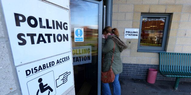 Voters arrive at Benchill Community Centre in Wythenshawe, Manchester, after voting in the Wythenshawe and Sale East by-election.