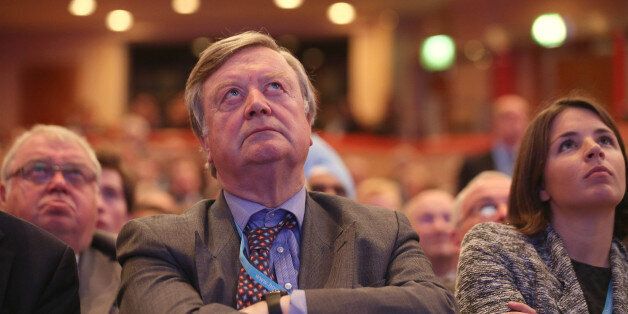 BIRMINGHAM, ENGLAND - OCTOBER 08: Former Justice Secretary Ken Clarke (C) watches a video at the Conservative party conference in the International Convention Centre on October 8, 2012 in Birmingham, England. The annual, four-day Conservative party conference began yesterday and features speeches from Cabinet ministers and the Mayor of London. (Photo by Oli Scarff/Getty Images)
