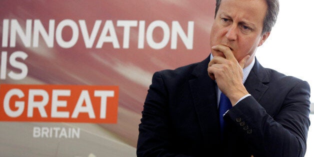 WANTAGE, ENGLAND - JULY 11: British Prime Minister David Cameron listens during a visit to officially open the Williams F1 new Advanced Engineering facility near Wantage on July 11, 2014 in Oxfordshire, England. (Photo by Kirsty Wigglesworth - WPA Pool/Getty Images)