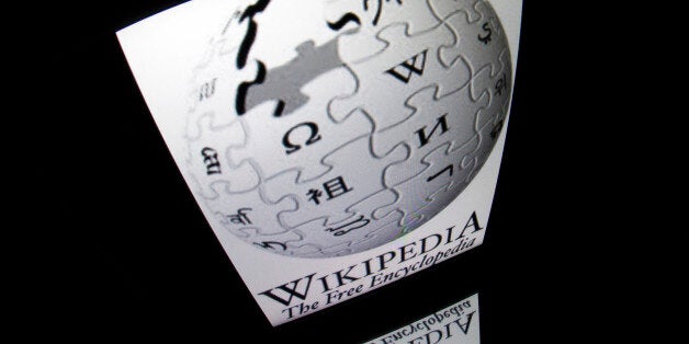 The 'Wikipedia' logo is seen on a tablet screen on December 4, 2012 in Paris. AFP PHOTO / LIONEL BONAVENTURE (Photo credit should read LIONEL BONAVENTURE/AFP/Getty Images)