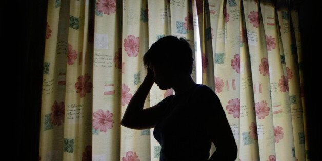 A silhouette of a child is seen, as a disturbing report revealed the number of UK-born children identified as being trafficked for sexual abuse more than doubled last year