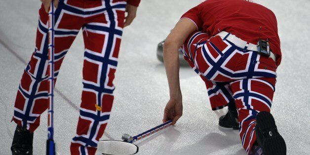 Norway's team members wear their official paints displaying national colours