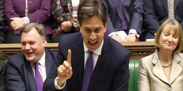 Shadow Chancellor Ed Balls (left) and Deputy Leader of the Labour Party Harriet Harman (right) listen as Labour party leader Ed Miliband speaks during Prime Minister's Questions in the House of Commons, London.