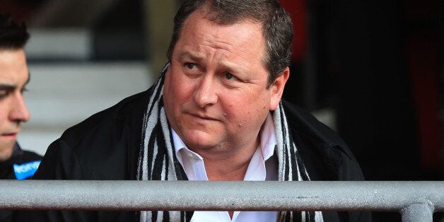 SOUTHAMPTON, ENGLAND - MARCH 29: Newcastle United owner Mike Ashley takes his seat prior to kickoff during the Barclays Premier League match between Southampton and Newcastle United at St Mary's Stadium on March 29, 2014 in Southampton, England. (Photo by Richard Heathcote/Getty Images)