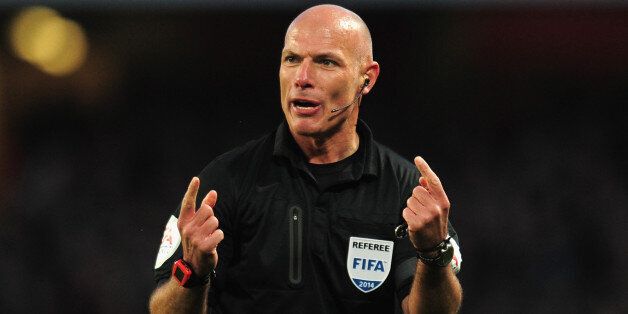 LONDON, ENGLAND - FEBRUARY 16: Referee Howard Webb during the FA Cup fifth round match between Arsenal and Liverpool at Emirates Stadium on February 16, 2014 in London, England. (Photo by Shaun Botterill/Getty Images)