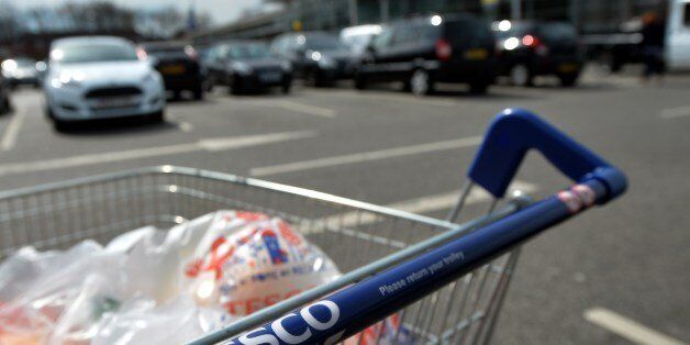 A picture shows a trolly of shopping a Tesco store in Liverpool, north west England on April 16, 2014. Supermarket giant Tesco announced a second drop in annual profits in a row on April 16, leaving Britain's biggest retailer hoping that recent expansion into India and China can offset weakness in Europe. AFP PHOTO / PAUL ELLIS (Photo credit should read PAUL ELLIS/AFP/Getty Images)