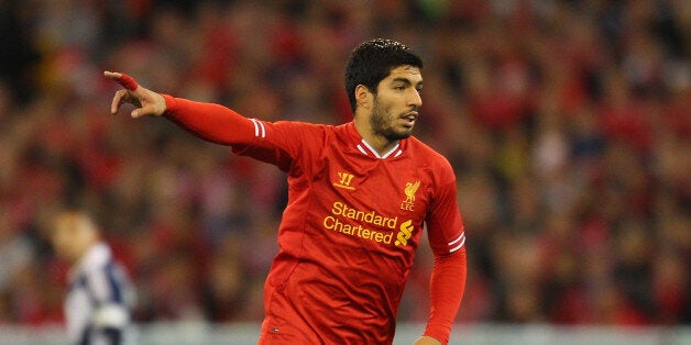 MELBOURNE, AUSTRALIA - JULY 24: Luis Suarez of Liverpool gestures during the match between the Melbourne Victory and Liverpool at the Melbourne Cricket Ground on July 24, 2013 in Melbourne, Australia. (Photo by Scott Barbour/Getty Images)