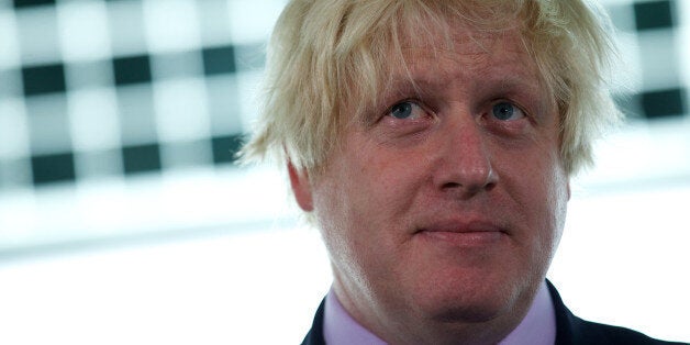 London Mayor Boris Johnson attends a press conference at City Hall during the launch of the Mayors Challenge in London on September 24, 2013. The 2013-2014 Mayors Challenge is a competition to inspire cities across Europe to develop innovative ideas to solve major problems. Johnson attended the launch with New York Mayor Michael Bloomberg, Mayor of Florence Matteo Renzi and Mayor of Warsaw Hanna Gronkiewicz-Waltz. AFP PHOTO / ANDREW COWIE (Photo credit should read ANDREW COWIE/AFP/Getty I