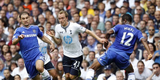 Tottenham Hotspur's Danish midfielder Christian Eriksen (C) vies with Chelsea's Serbian defender Branislav Ivanovic (L) and Chelsea's Nigerian midfielder John Obi Mikel during the English Premier League football match between Tottenham Hotspur and Chelsea at White Hart Lane in London on September 28, 2013. AFP PHOTO/ IAN KINGTON - RESTRICTED TO EDITORIAL USE. NO USE WITH UNAUTHORIZED AUDIO, VIDEO, DATA, FIXTURE LISTS, CLUB/LEAGUE LOGOS OR LIVE SERVICES. ONLINE IN-MATCH USE LIMITED TO 45 IMAGES, NO VIDEO EMULATION. NO USE IN BETTING, GAMES OR SINGLE CLUB/LEAGUE/PLAYER PUBLICATIONS (Photo credit should read IAN KINGTON/AFP/Getty Images)