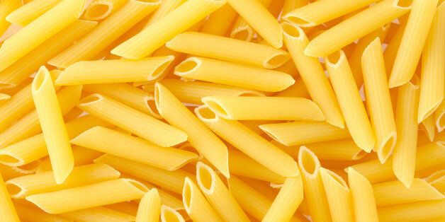 pasta penne texture background. ...