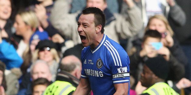 LONDON, ENGLAND - FEBRUARY 22: John Terry of Chelsea celebrates as Frank Lampard scores their first goal during the Barclays Premier League match between Chelsea and Everton at Stamford Bridge on February 22, 2014 in London, England. (Photo by Scott Heavey/Getty Images)