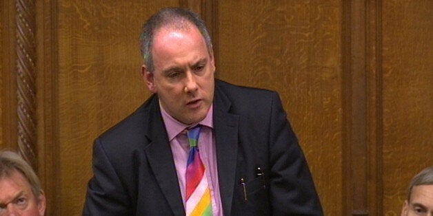 MP for Harlow Robert Halfon asks Prime Minister David Cameron a question during Prime Minister's Questions in the House of Commons, London.