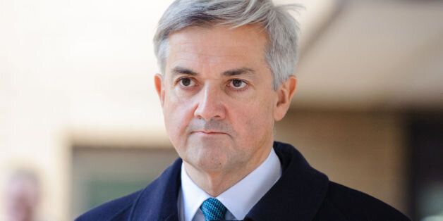 Former Energy Secretary Chris Huhne leaves Southwark Crown Court, in central London, after Mr Huhne pleaded guilty to perverting the course of justice.