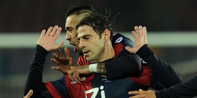 NAPLES, ITALY - FEBRUARY 24: Emanuele Calaio of Genoa celebrates after scoring the goal 1-1 during the Serie A match between SSC Napoli and Genoa CFC at Stadio San Paolo on February 24, 2014 in Naples, Italy. (Photo by Giuseppe Bellini/Getty Images)