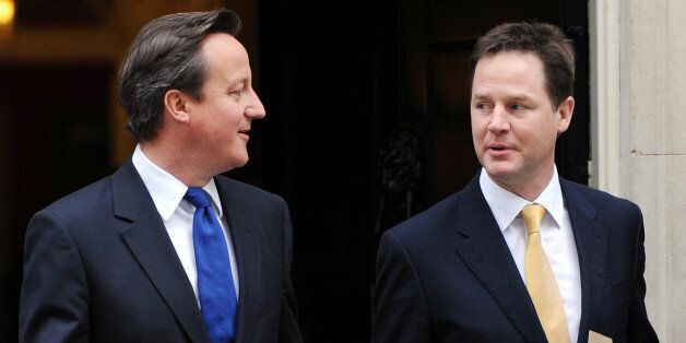 Prime Minister David Cameron (left) and Deputy Prime Minister Nick Clegg, leave 10 Downing Street, London, following a cabinet meeting, as they head off for a visit to Essex.
