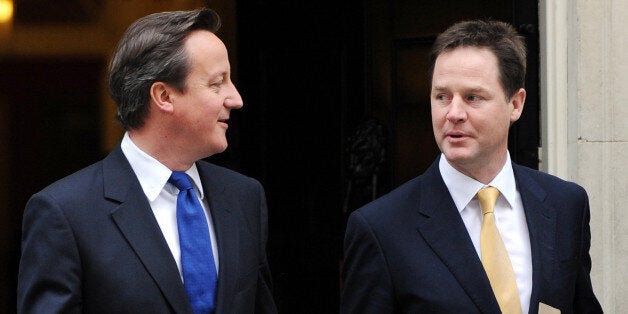 Prime Minister David Cameron (left) and Deputy Prime Minister Nick Clegg, leave 10 Downing Street, London, following a cabinet meeting, as they head off for a visit to Essex.