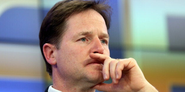 Nick Clegg, U.K. deputy prime minister, pauses during a session on day two of the World Economic Forum (WEF) in Davos, Switzerland, on Thursday, Jan. 23, 2014. World leaders, influential executives, bankers and policy makers attend the 44th annual meeting of the World Economic Forum in Davos, the five day event runs from Jan. 22-25. Photographer: Chris Ratcliffe/Bloomberg via Getty Images