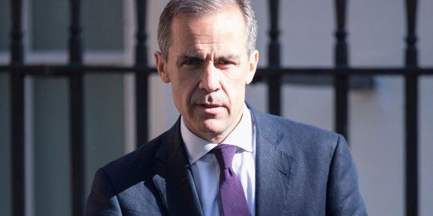 LONDON, ENGLAND - JULY 16: Mark Carney, the Governor of the Bank of England, leaves Number 11 Downing Street after meeting with Chancellor of the Exchequer George Osborne on July 16, 2014 in London, England. British Prime Minister David Cameron has been conducting a reshuffle of his Cabinet team this week. (Photo by Oli Scarff/Getty Images)