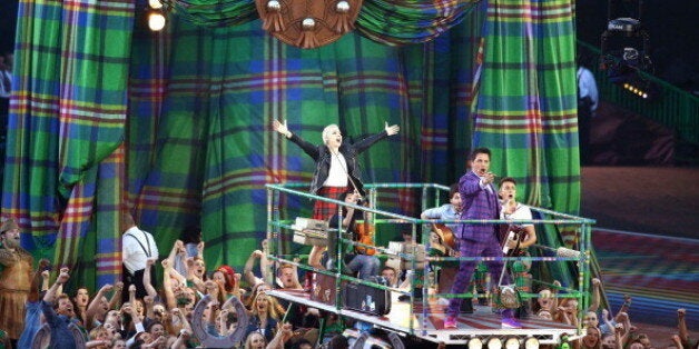 Singers Karen Dunbar and John Barrowman perform during the Opening Ceremony for the Glasgow 2014 Commonwealth Games at Celtic Park on July 23, 2014 in Glasgow, Scotland. (Photo by Richard Heathcote/Getty Images)