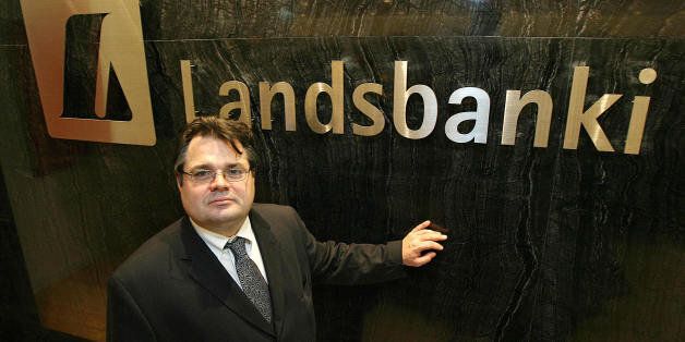 (FILES) A picture taken on November 9, 2007 shows the CEO of Iceland's Landsbanki bank Sigurjon Arnason posing in Hong Kong. Iceland's stock market suspended trading in all financial shares including three major banks on Monday, amid government talks on a possible rescue for the banking sector. Conservative Prime Minister Geir Haarde was holding a crisis meeting with opposition leaders on a possible rescue plan for banks, a government spokeswoman said. Trading in Kaupthing, Landsbanki and Glit