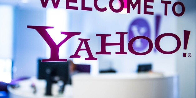 A welcome message sits on the window in the reception area of the sales office at the Yahoo Inc. headquarters in Barcelona, Spain, on Thursday, Feb. 20, 2014. A smart city initiative, which also involves rolling out electric vehicles and bikes and making neighborhood blocks' energy output self-sufficient, widescale deployment of sensors and quick-response codes to 8,000 points around the city by the end of the year to provide location-based information to anyone with a smartphone, could save Barcelona 3 billion euros in the next decade. Photographer: David Ramos/Bloomberg via Getty Images