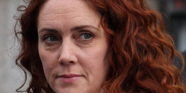 LONDON, ENGLAND - DECEMBER 06: Rebekah Brooks, the former head of News International, leaves The Old Bailey on December 6, 2012 in London, England. Rebekah Brooks, Andy Coulson, Clive Goodman, John Kay and MoD employee Bettina Jordan-Barber have been charged as part of 'Operation Elveden,' the Metropolitan Police's investigation into corrupt payments to police and public officials. They all appeared today at the Old Bailey. (Photo by Dan Kitwood/Getty Images)